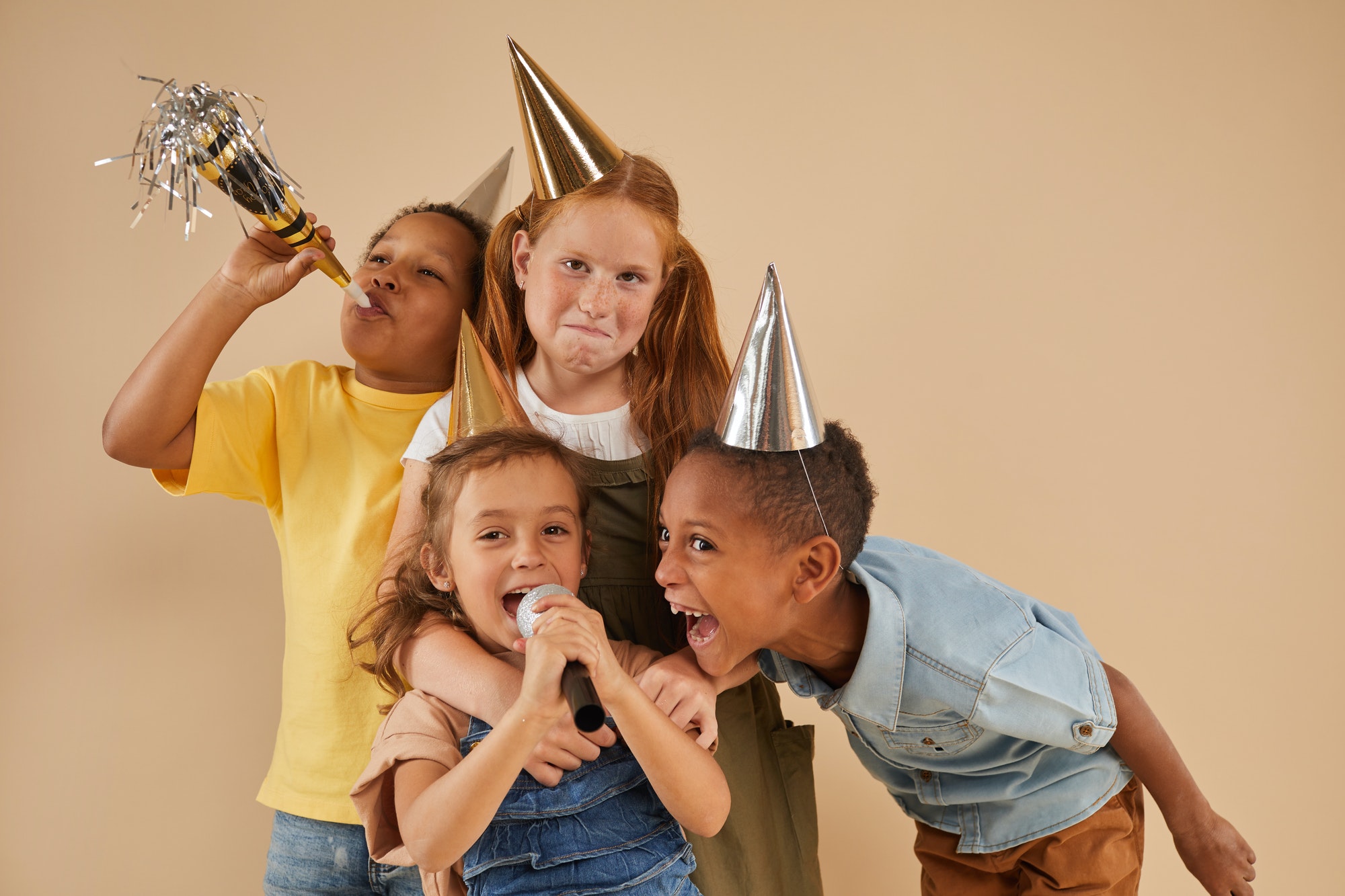 children-playing-with-microphone-at-party.jpg
